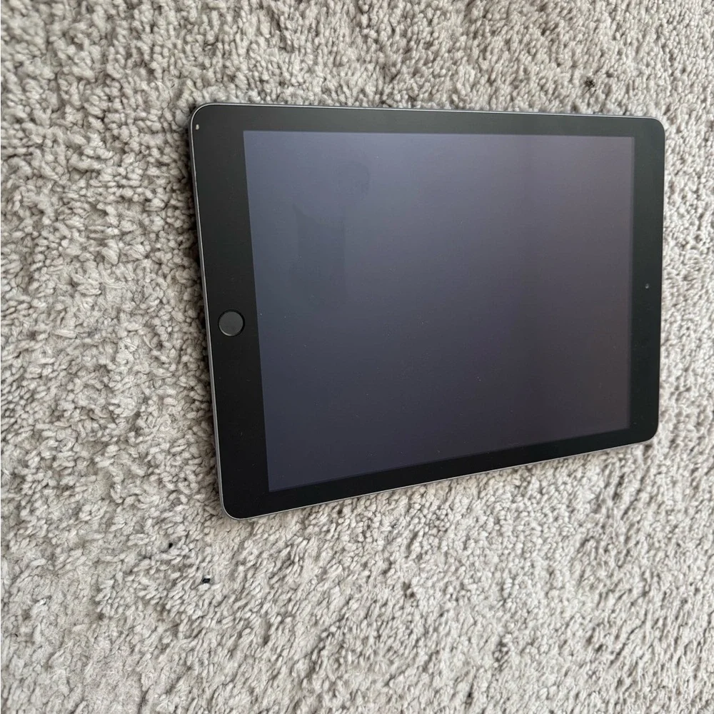 Apple Black iPad with Sleek Design and Thin Bezel